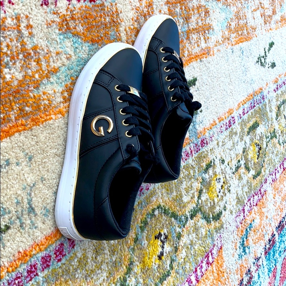 Black and gold G by GUESS shoes